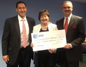 CYC Board Chair Kent Wellington, CYC President and CEO Jane Keller, and AT&T Director of External Affairs Mark A Romito
